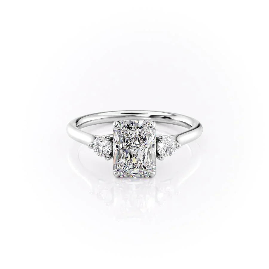 The Lia. A White Gold Three Stone Engagement Ring Set With A 2ct Radiant Lab Grown Diamond. White Background.