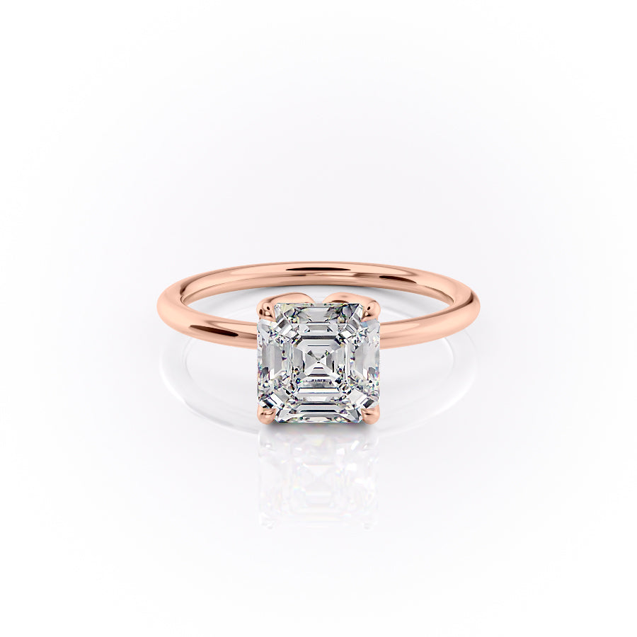 The Lisa. A Rose Gold Solitaire, Nature Engagement Ring Set With A 2ct Asscher Lab Grown Diamond. White Background.
