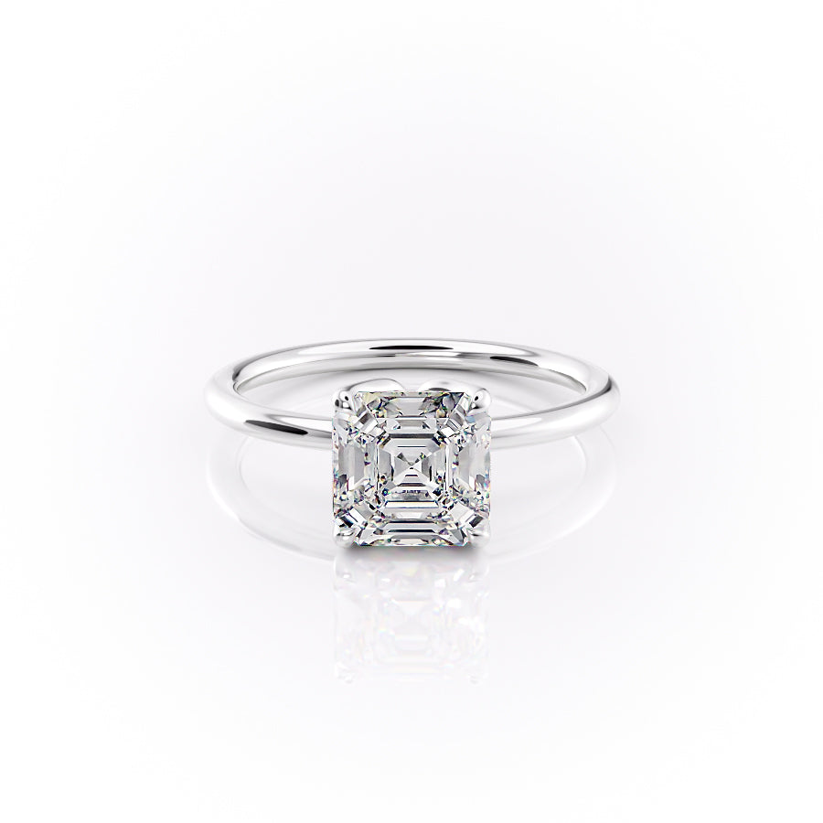 The Lisa. A White Gold Solitaire, Nature Engagement Ring Set With A 2ct Asscher Lab Grown Diamond. White Background.