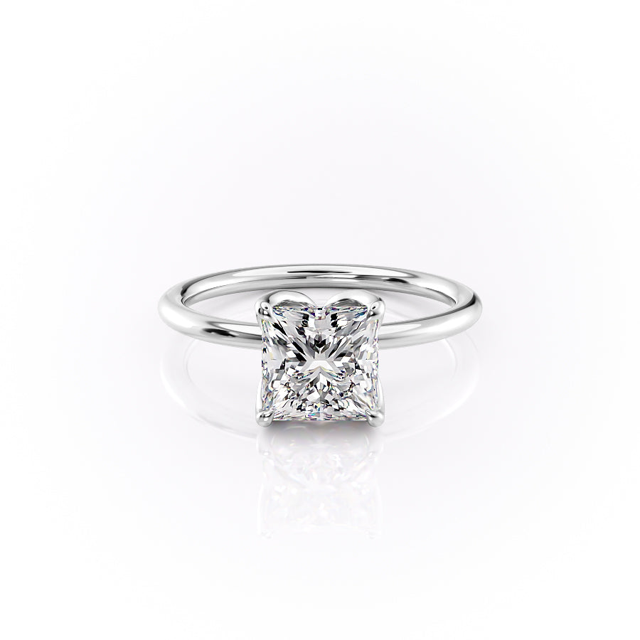 The Lisa. A White Gold Solitaire, Nature Engagement Ring Set With A 2ct Princess Lab Grown Diamond. White Background.