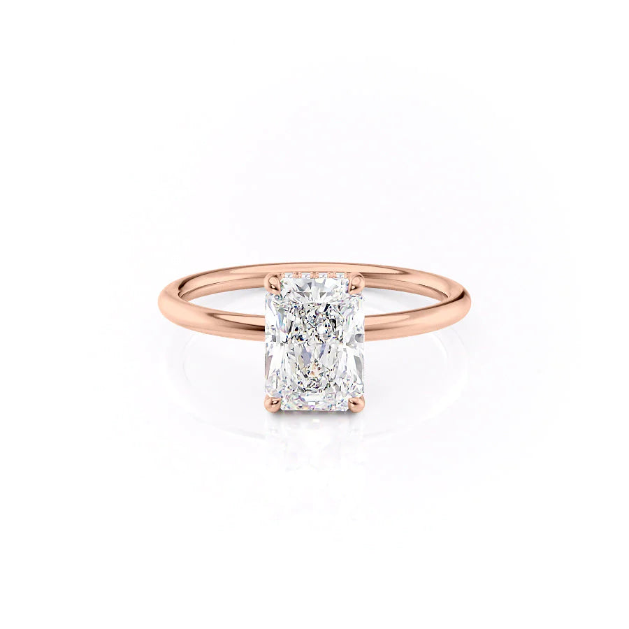 The Low Profile Kamellie. A Rose Gold Solitaire, Hidden Halo Engagement Ring Set With A 2ct Radiant Lab Grown Diamond. White Background.
