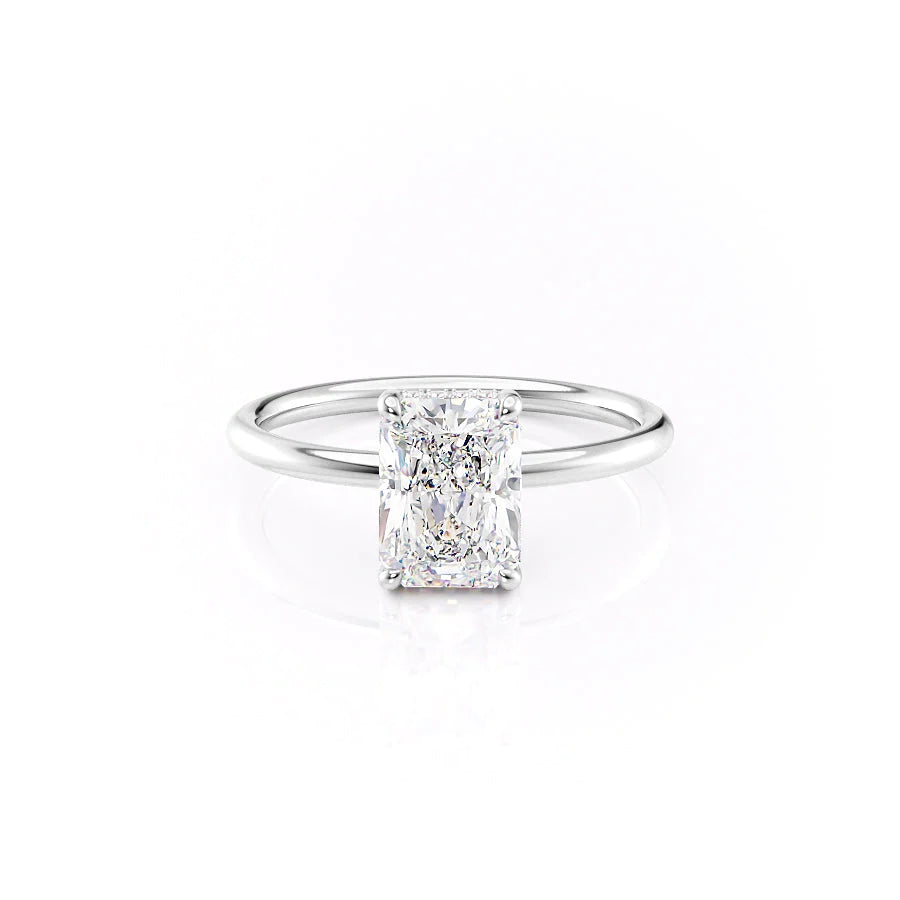 The Low Profile Kamellie. A White Gold Solitaire, Hidden Halo Engagement Ring Set With A 2ct Radiant Lab Grown Diamond. White Background.
