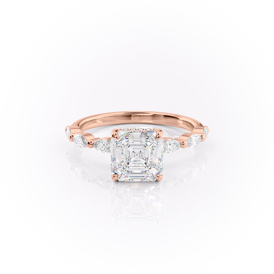 The Lucia. A Rose Gold Side Stones, Hidden Halo Engagement Ring Set With A 2ct Asscher Lab Grown Diamond. White Background.