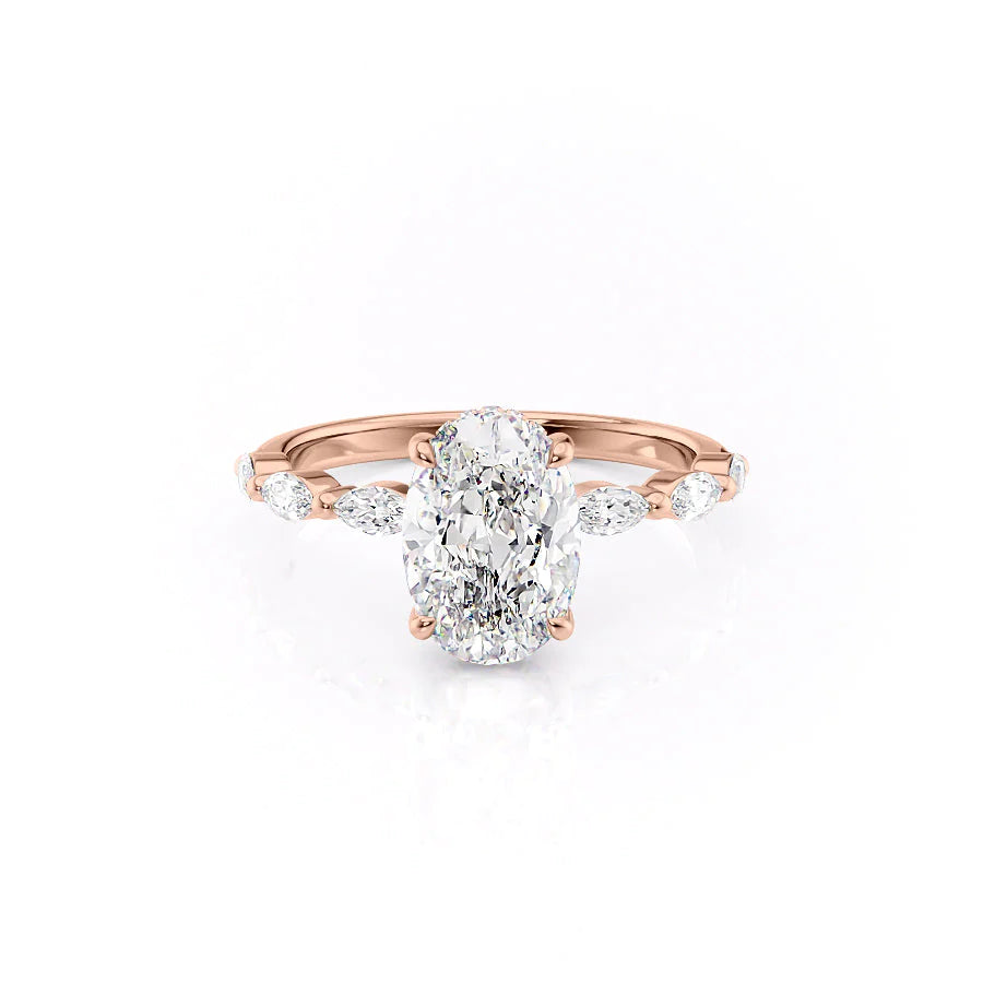 The Lucia. A Rose Gold Side Stones, Hidden Halo Engagement Ring Set With A 2ct Oval Lab Grown Diamond. White Background.