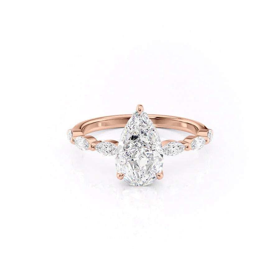 The Lucia. A Rose Gold Side Stones, Hidden Halo Engagement Ring Set With A 2ct Pear Lab Grown Diamond. White Background.