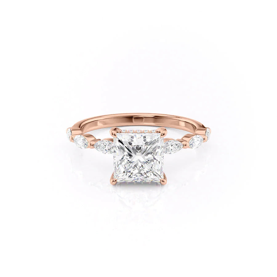 The Lucia. A Rose Gold Side Stones, Hidden Halo Engagement Ring Set With A 2ct Princess Lab Grown Diamond. White Background.