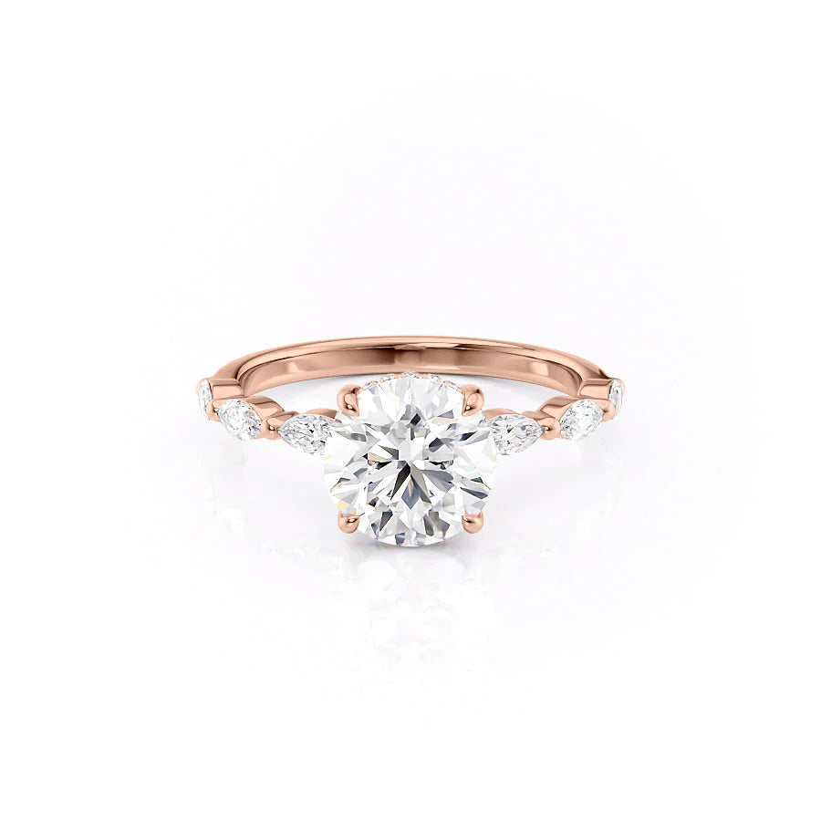 The Lucia. A Rose Gold Side Stones, Hidden Halo Engagement Ring Set With A 2ct Round Lab Grown Diamond. White Background.