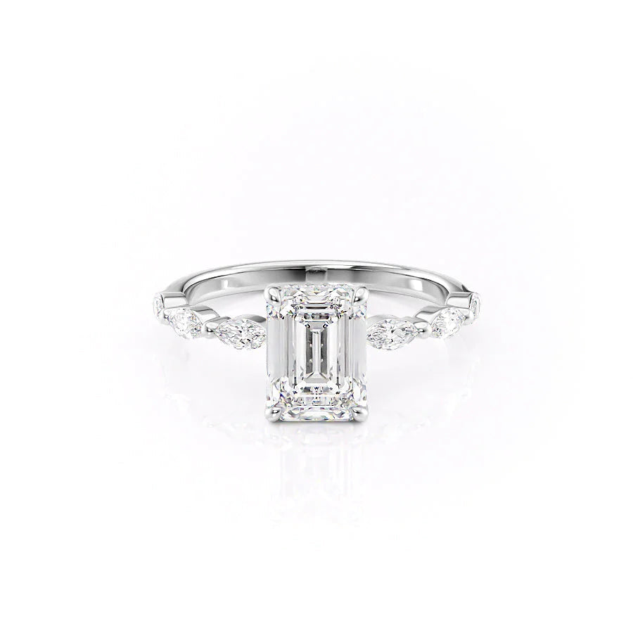 The Lucia. A White Gold Side Stones, Hidden Halo Engagement Ring Set With A 2ct Emerald Lab Grown Diamond. White Background.