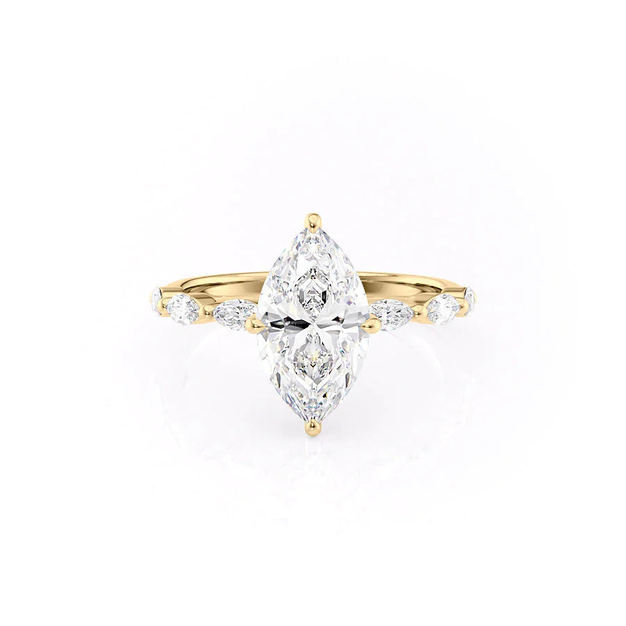 The Lucia. A Yellow Gold Side Stones, Hidden Halo Engagement Ring Set With A 2ct Marquise Lab Grown Diamond. White Background.