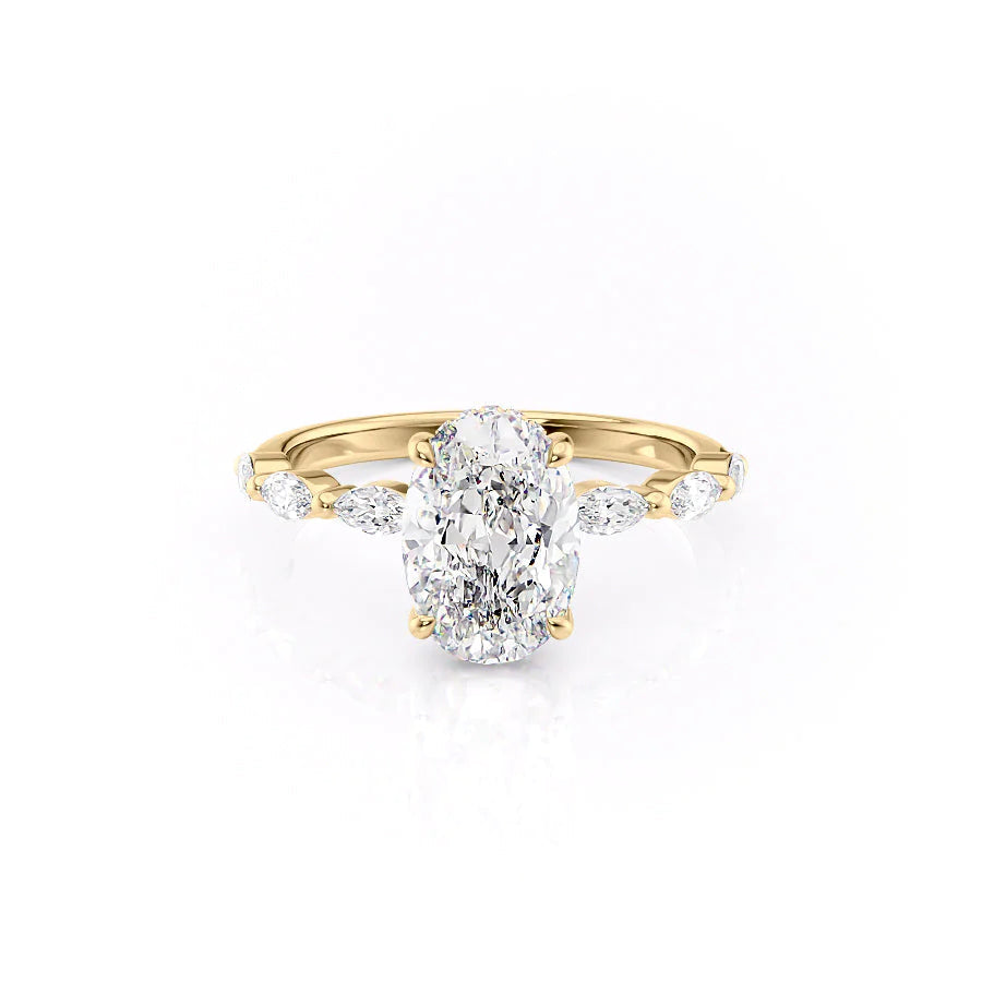 The Lucia. A Yellow Gold Side Stones, Hidden Halo Engagement Ring Set With A 2ct Oval Lab Grown Diamond. White Background.