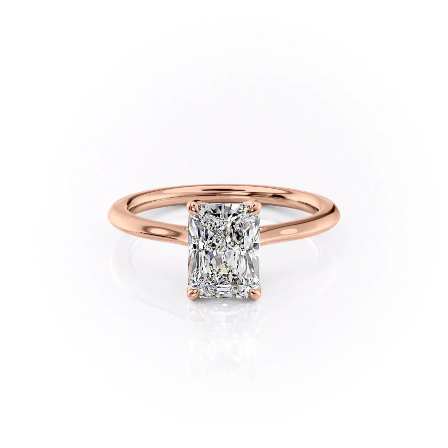 The Madison. A Rose Gold Solitaire, Nature Engagement Ring Set With A 2ct Radiant Lab Grown Diamond. White Background.