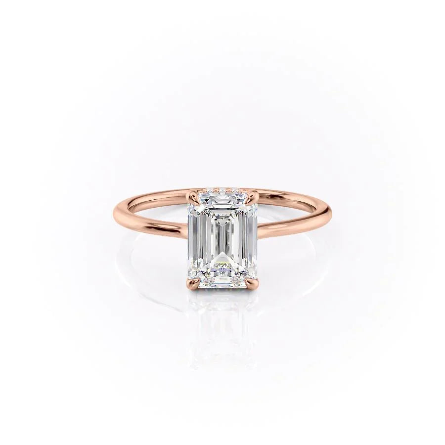 The Maia. A Rose Gold Solitaire, Hidden Halo Engagement Ring Set With A 2ct Emerald Lab Grown Diamond. White Background.