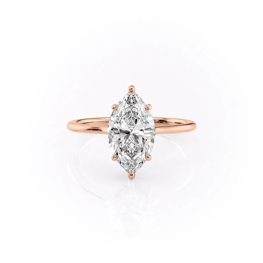 The Maia. A Rose Gold Solitaire, Hidden Halo Engagement Ring Set With A 2ct Marquise Lab Grown Diamond. White Background.