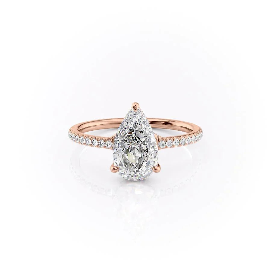 The Mandy. A Rose Gold Pave, Hidden Halo Engagement Ring Set With A 2ct Pear Lab Grown Diamond. White Background.