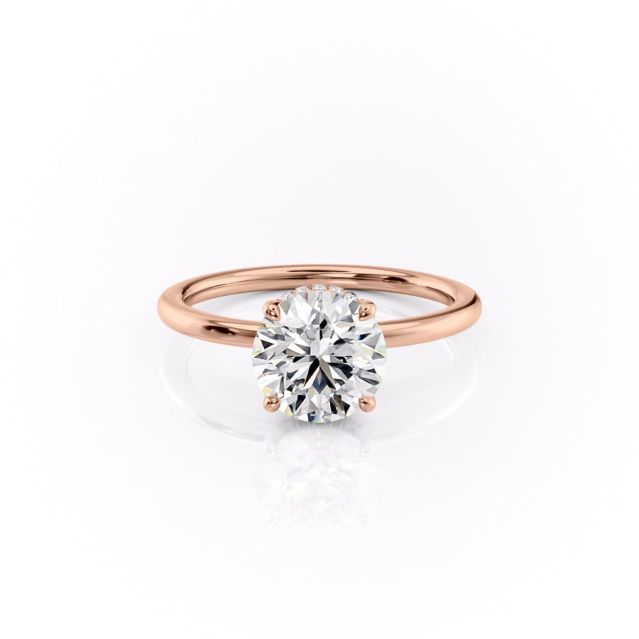 The Margot. A Rose Gold Solitaire, Hidden Halo Engagement Ring Set With A 2ct Round Lab Grown Diamond. White Background.