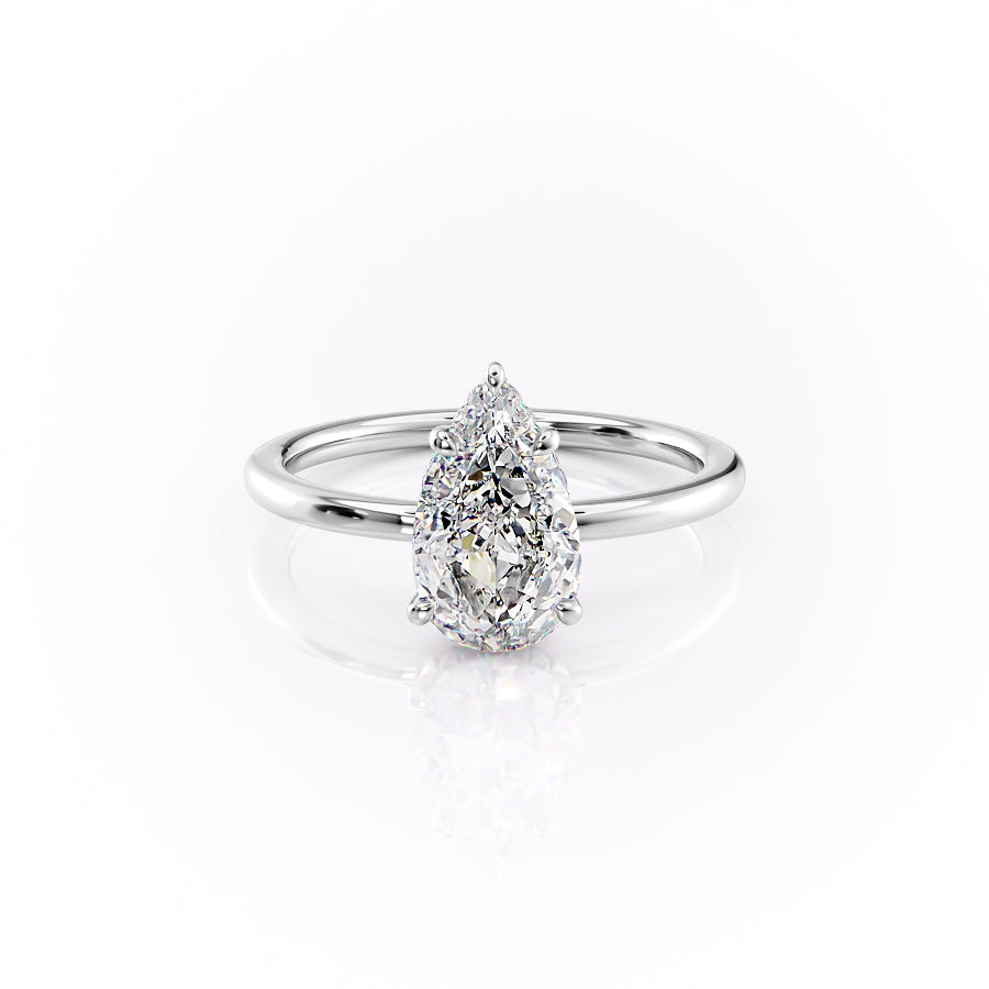 The Margot. A White Gold Solitaire, Hidden Halo Engagement Ring Set With A 2ct Pear Lab Grown Diamond. White Background.
