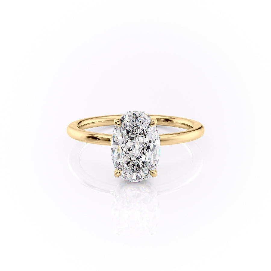 The Margot. A Yellow Gold Solitaire, Hidden Halo Engagement Ring Set With A 2ct Oval Lab Grown Diamond. White Background.