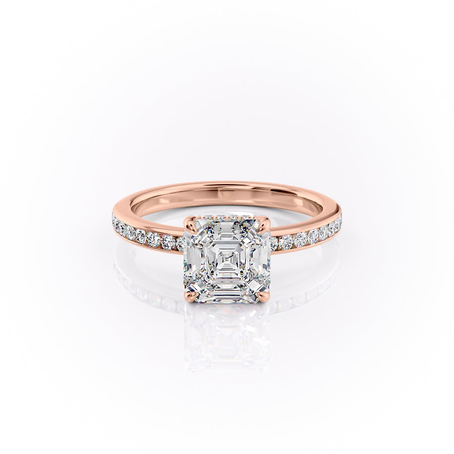 The Marilyn. A Rose Gold Channel-Set, Side Stones, Hidden Halo Engagement Ring Set With A 2ct Asscher Lab Grown Diamond. White Background.
