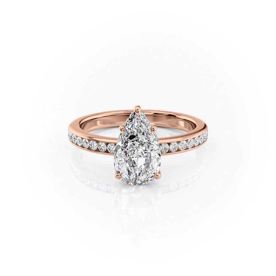 The Marilyn. A Rose Gold Channel-Set, Side Stones, Hidden Halo Engagement Ring Set With A 2ct Pear Lab Grown Diamond. White Background.