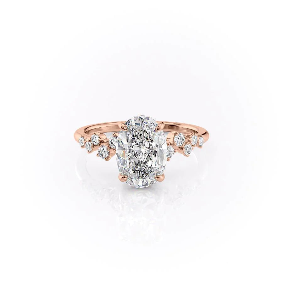The Mia. A Rose Gold Side Stones, Hidden Halo Engagement Ring Set With A 2ct Oval Lab Grown Diamond. White Background.