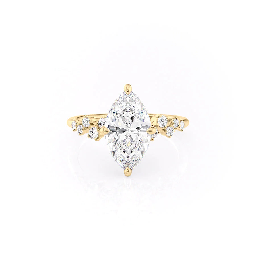 The Mia. A Yellow Gold Side Stones, Hidden Halo Engagement Ring Set With A 2ct Marquise Lab Grown Diamond. White Background.