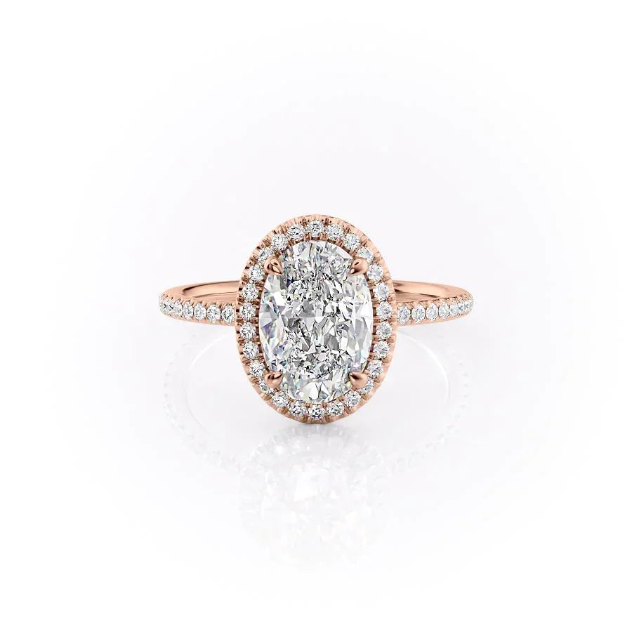 The Michelle. A Rose Gold Halo, Pave Engagement Ring Set With A 2ct Oval Lab Grown Diamond. White Background.