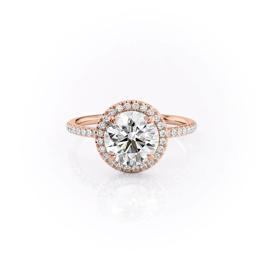 The Michelle. A Rose Gold Halo, Pave Engagement Ring Set With A 2ct Round Lab Grown Diamond. White Background.