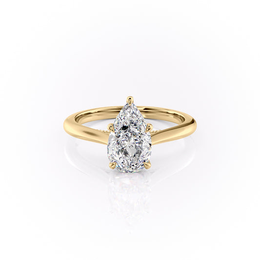 The Miranda. A Yellow Gold Vintage, Solitaire Engagement Ring Set With A 2ct Pear Lab Grown Diamond. White Background.