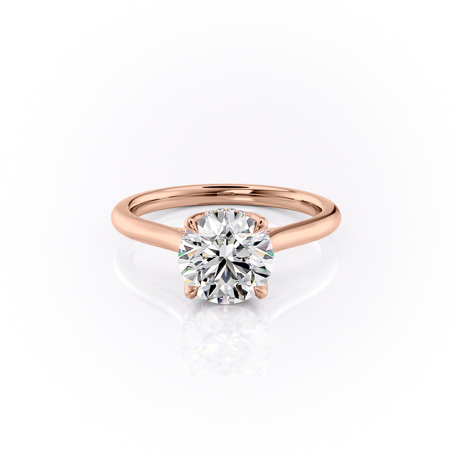 The Morgan. A Rose Gold Hidden Halo, Solitaire, Nature Engagement Ring Set With A 2ct Round Lab Grown Diamond. White Background.