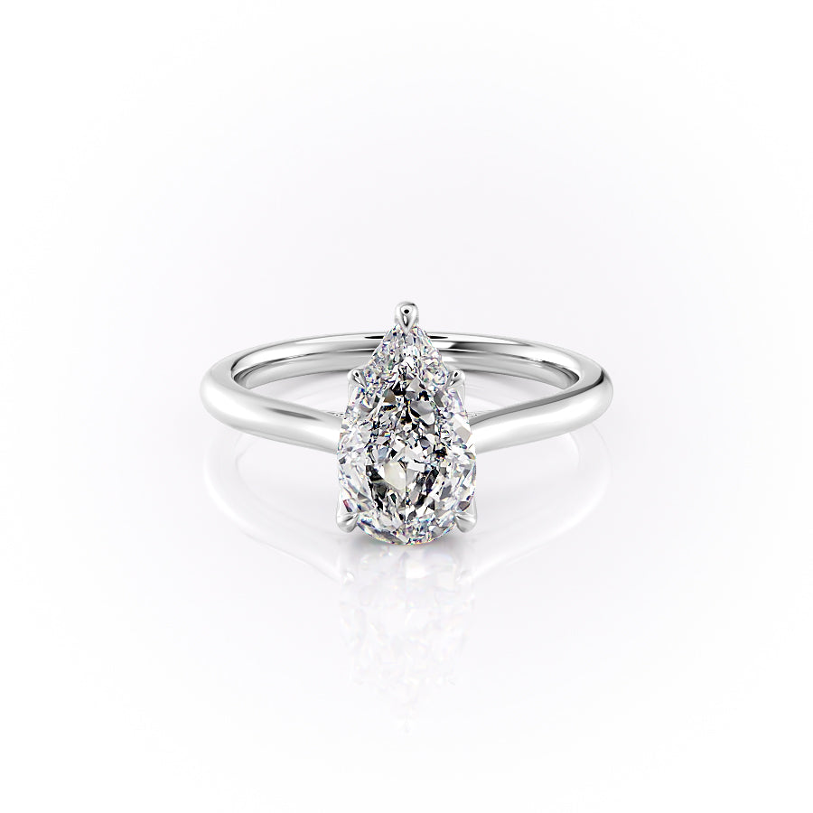 The Morgan. A White Gold Hidden Halo, Solitaire, Nature Engagement Ring Set With A 2ct Pear Lab Grown Diamond. White Background.