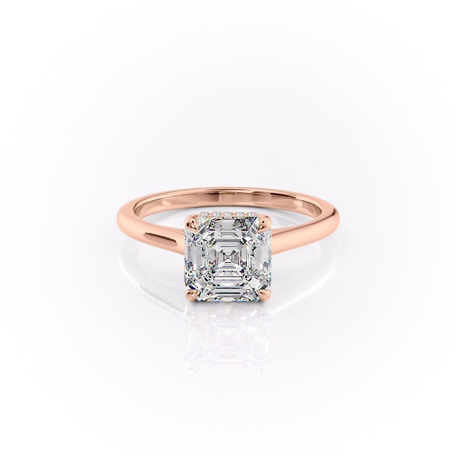 The Natalie. A Rose Gold Solitaire, Hidden Halo Engagement Ring Set With A 2ct Asscher Lab Grown Diamond. White Background.