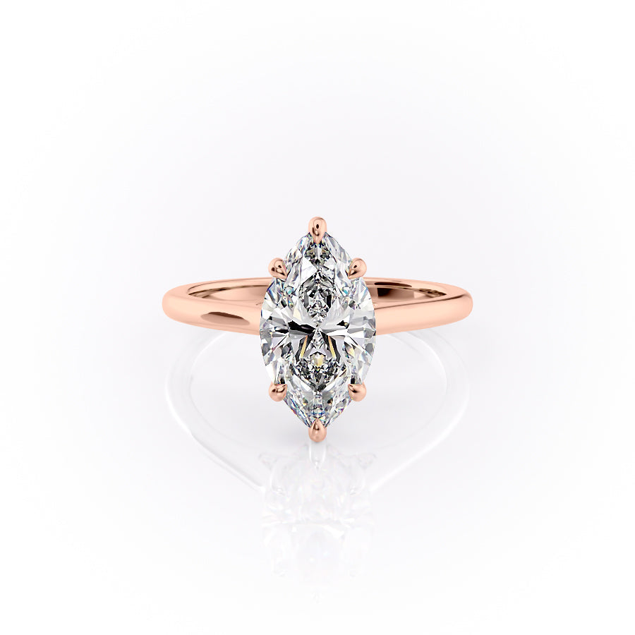 The Natalie. A Rose Gold Solitaire, Hidden Halo Engagement Ring Set With A 2ct Marquise Lab Grown Diamond. White Background.