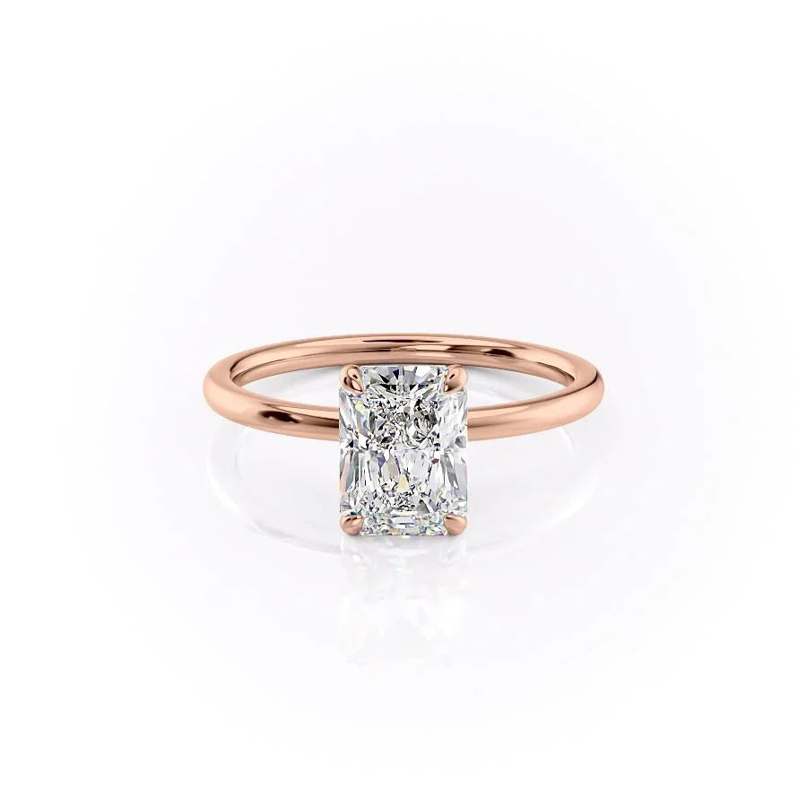 The Nelly. A Rose Gold Solitaire, Hidden Halo Engagement Ring Set With A 2ct Radiant Lab Grown Diamond. White Background.