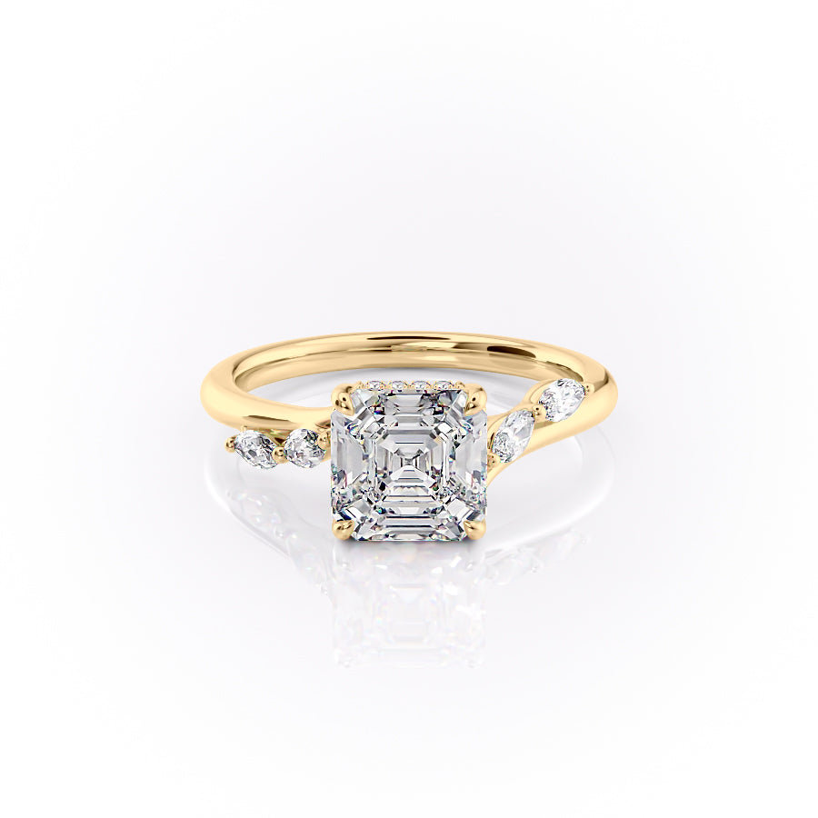 The Nova. A Yellow Gold Side Stones, Hidden Halo Engagement Ring Set With A 2ct Asscher Lab Grown Diamond. White Background.