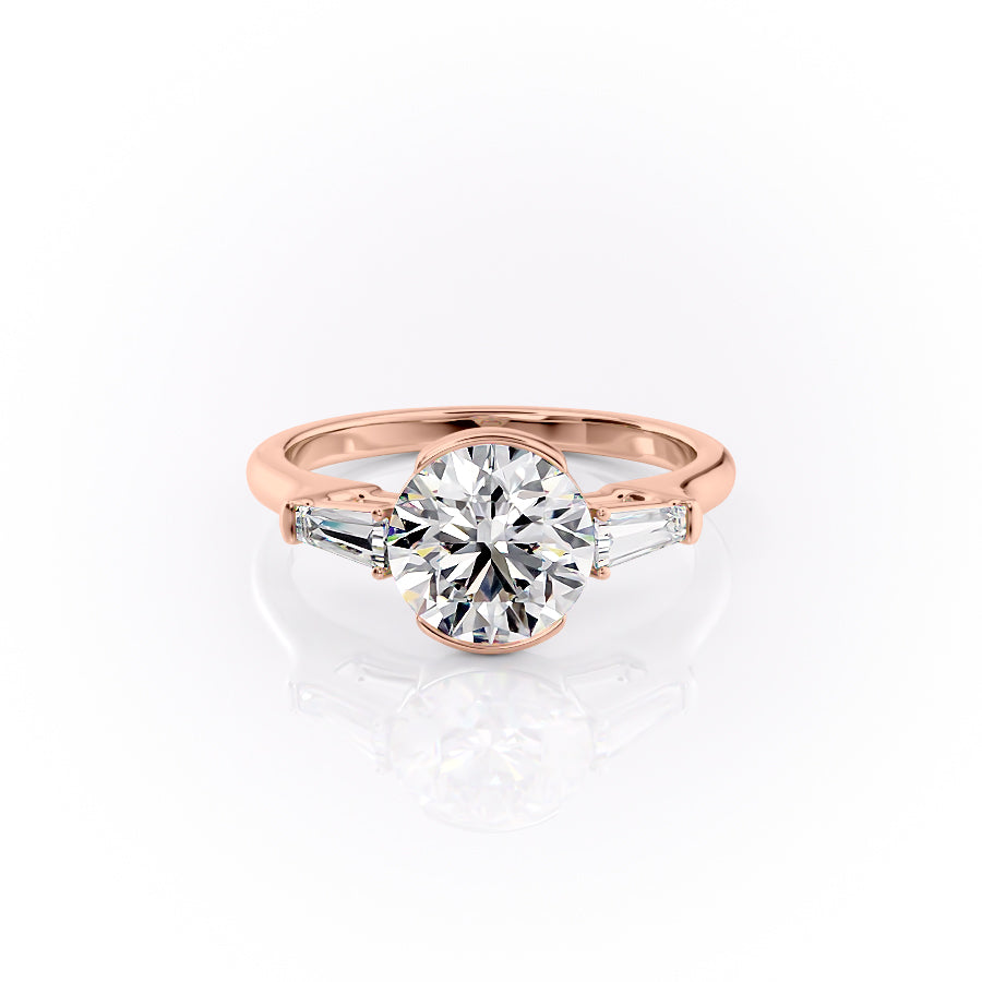 The Parker. A Rose Gold Three Stone, Bezel Engagement Ring Set With A 2ct Round Lab Grown Diamond. White Background.