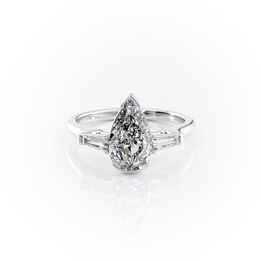 The Parker. A White Gold Three Stone, Bezel Engagement Ring Set With A 2ct Pear Lab Grown Diamond. White Background.