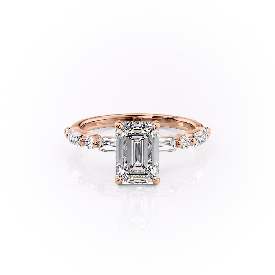 The Patricia. A Rose Gold Side Stones, Hidden Halo Engagement Ring Set With A 2ct Emerald Lab Grown Diamond. White Background.
