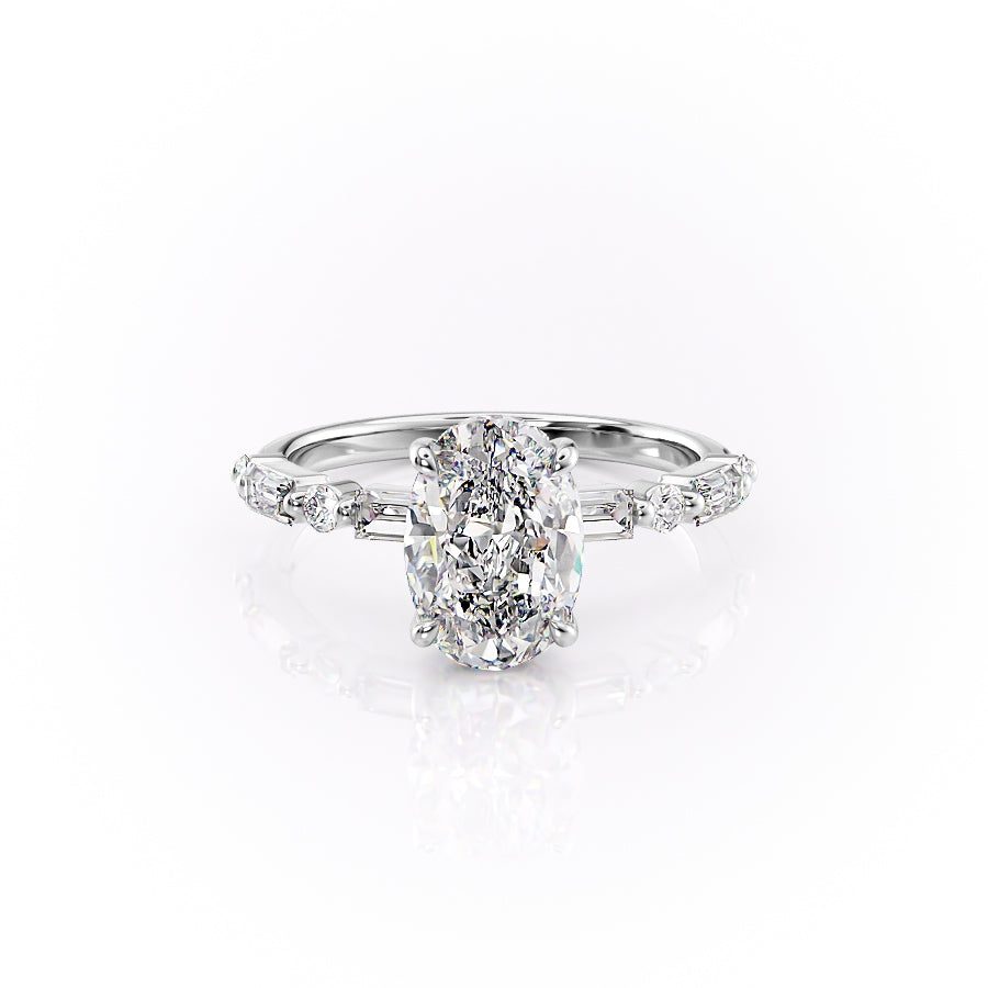 The Patricia. A White Gold Side Stones, Hidden Halo Engagement Ring Set With A 2ct Oval Lab Grown Diamond. White Background.