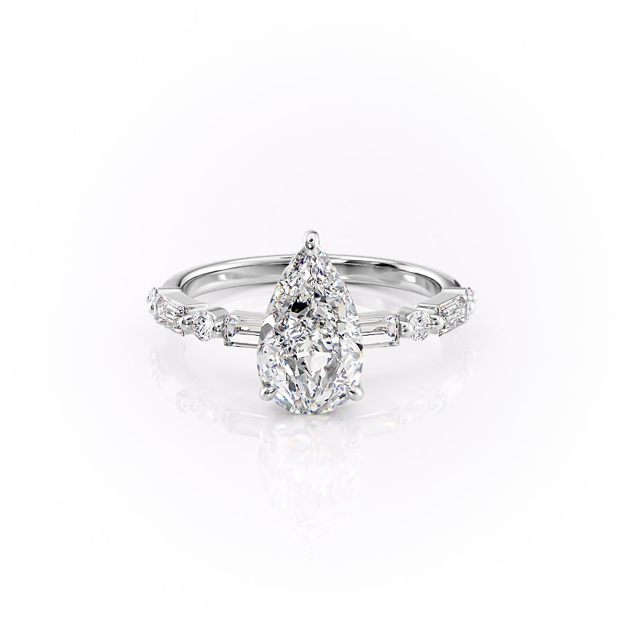 The Patricia. A White Gold Side Stones, Hidden Halo Engagement Ring Set With A 2ct Pear Lab Grown Diamond. White Background.