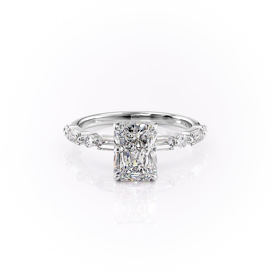 The Patricia. A White Gold Side Stones, Hidden Halo Engagement Ring Set With A 2ct Radiant Lab Grown Diamond. White Background.