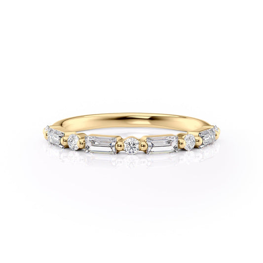 The Patricia. A Yellow Gold Prong Wedding Band Set With 0.35tcw Baguette Lab Grown Diamonds. White Background.
