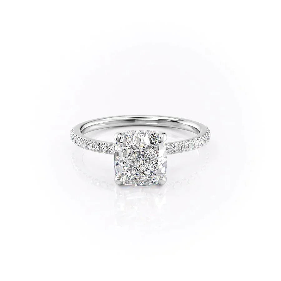 The Pave Aline. A White Gold Hidden Halo Engagement Ring Set With A 2ct Cushion Lab Grown Diamond. White Background.