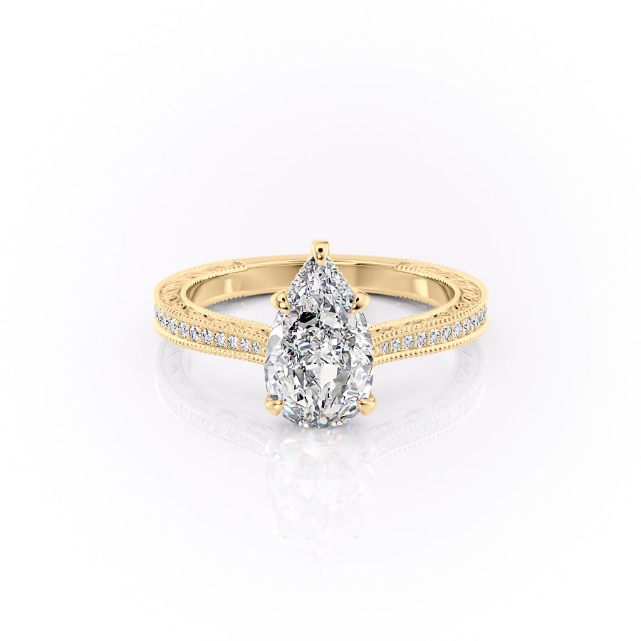 The Pave Cathedral Sierra. A Yellow Gold Vintage Engagement Ring Set With A 2ct Pear Lab Grown Diamond. White Background.