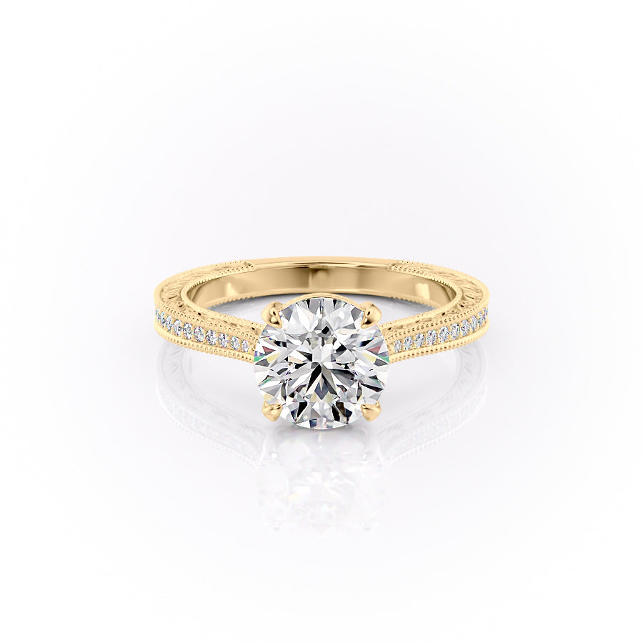 The Pave Cathedral Sierra. A Yellow Gold Vintage Engagement Ring Set With A 2ct Round Lab Grown Diamond. White Background.