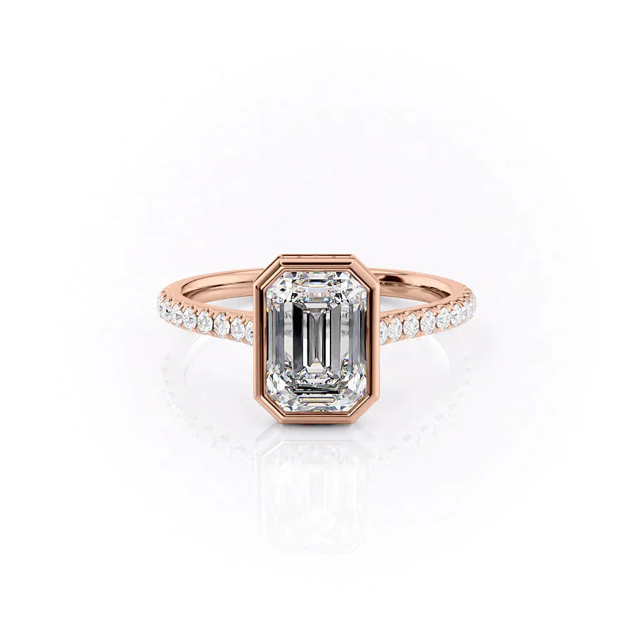 The Pave Charlotte. A Rose Gold Vintage, Hidden Halo, Bezel Engagement Ring Set With A 2ct Emerald Lab Grown Diamond. White Background.