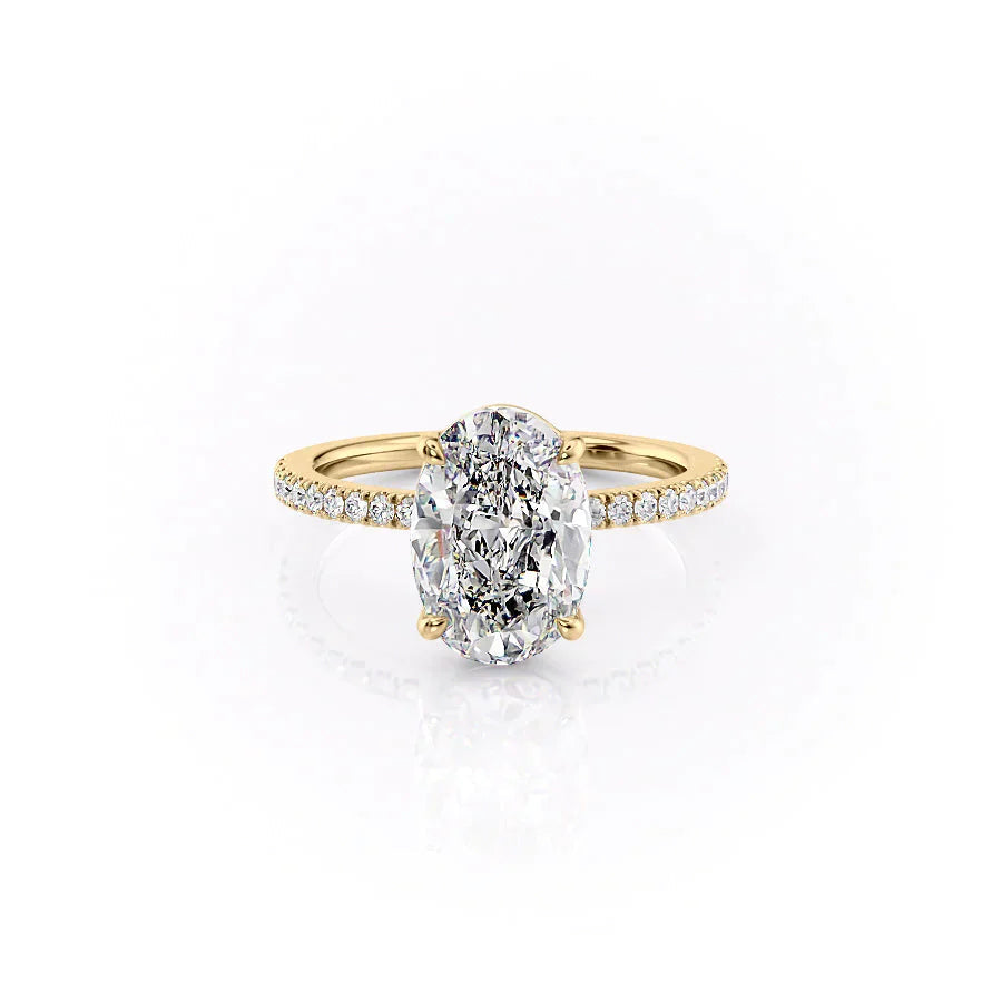 The Pave Eleanor. A Yellow Gold Engagement Ring Set With A 2ct Oval Lab Grown Diamond. White Background.