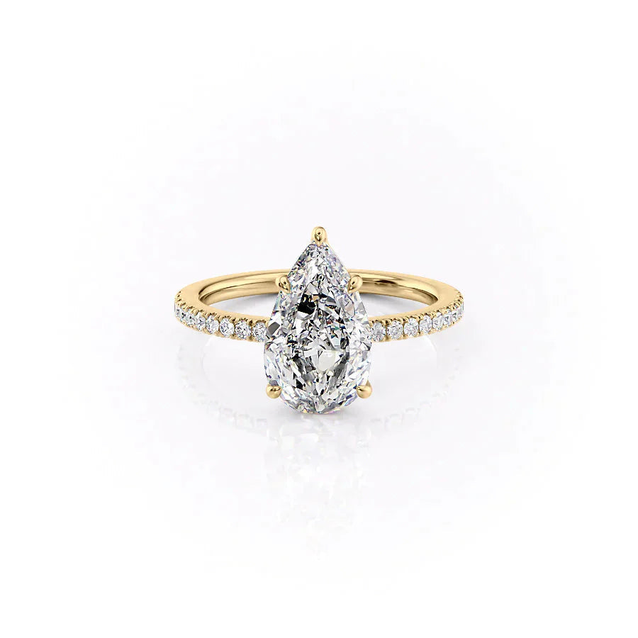 The Pave Eleanor. A Yellow Gold Engagement Ring Set With A 2ct Pear Lab Grown Diamond. White Background.