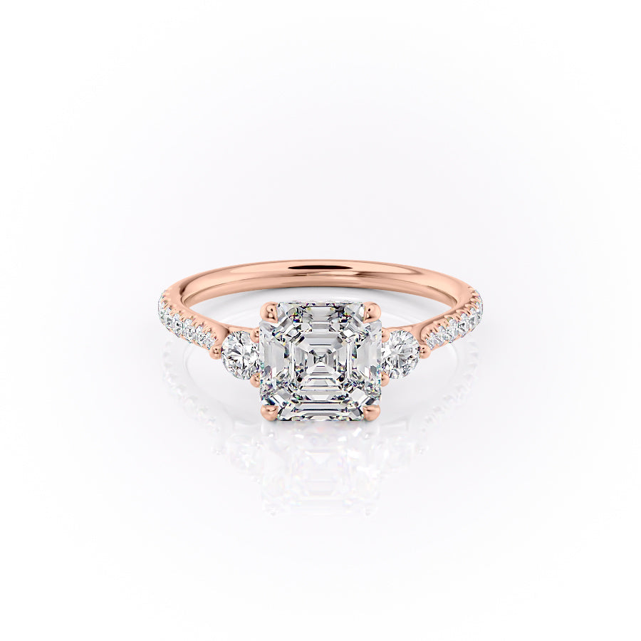 The Pave Lia. A Rose Gold Three Stone Engagement Ring Set With A 2ct Asscher Lab Grown Diamond. White Background.