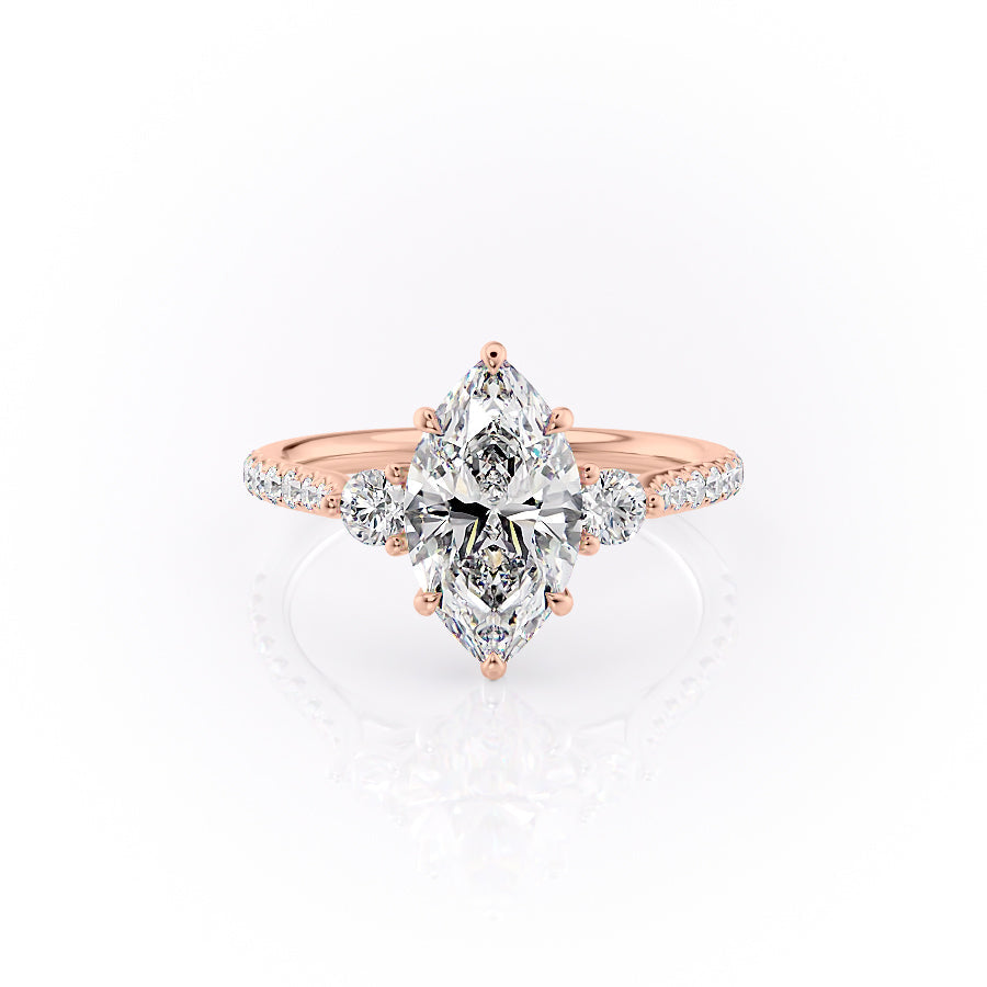 The Pave Lia. A Rose Gold Three Stone Engagement Ring Set With A 2ct Marquise Lab Grown Diamond. White Background.