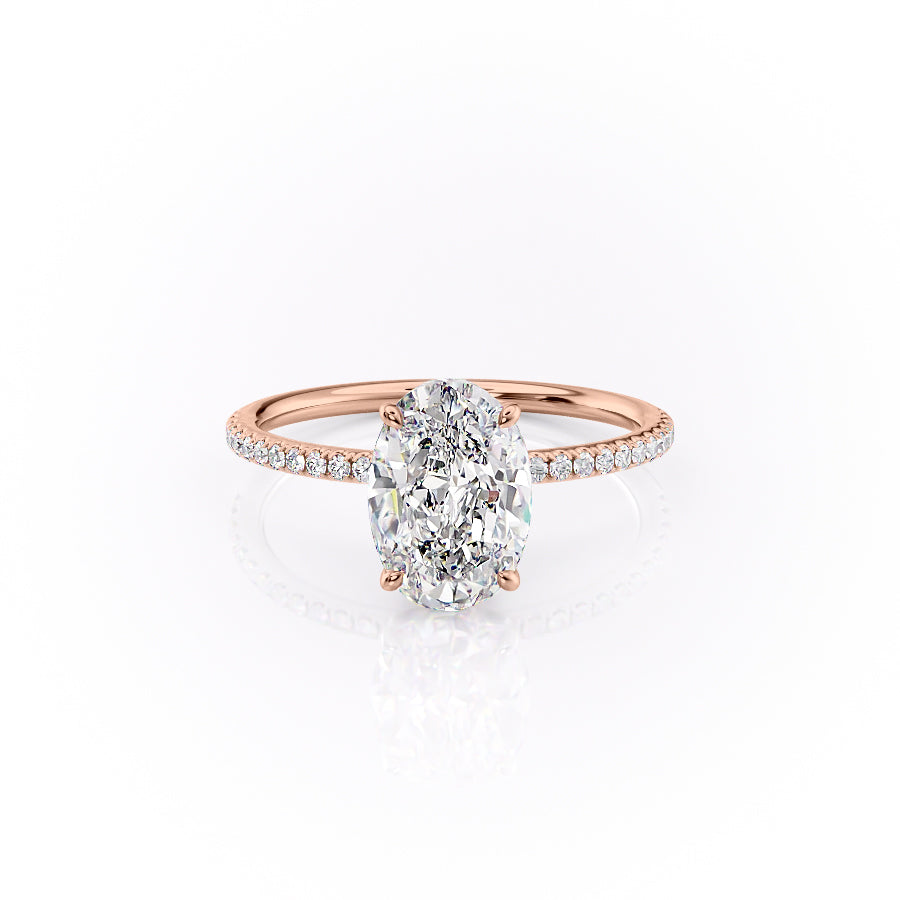 The Pave Lily. A Rose Gold Nature Engagement Ring Set With A 2ct Oval Lab Grown Diamond. White Background.